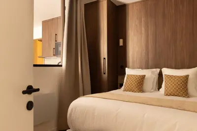 Un ou plusieurs lits dans un hébergement de l'établissement Elegant apartment - AC- 2BR-6P- Madeleine