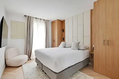 Un ou plusieurs lits dans un hébergement de l'établissement Charming apartment - AC- 3BR-6P- Montorgueil