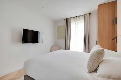 Télévision ou salle de divertissement dans l'établissement Charming apartment - AC- 3BR-6P- Montorgueil