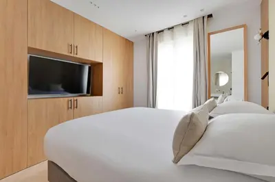 Télévision ou salle de divertissement dans l'établissement Charming apartment - AC- 3BR-6P- Montorgueil