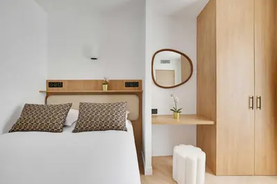 Un ou plusieurs lits dans un hébergement de l'établissement Charming apartment - AC- 3BR-6P- Montorgueil
