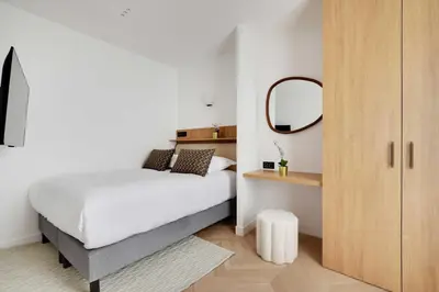 Un ou plusieurs lits dans un hébergement de l'établissement Charming apartment - AC- 3BR-6P- Montorgueil