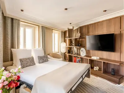 Télévision ou salle de divertissement dans l'établissement Merveil - Signature Suite - Eiffel Tower terrace