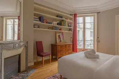 Un ou plusieurs lits dans un hébergement de l'établissement Paris Courcelles Prestige Residence