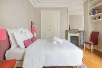 Un ou plusieurs lits dans un hébergement de l'établissement Paris Courcelles Prestige Residence