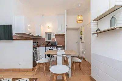 Cuisine ou kitchenette dans l'établissement Cœur de Voltaire - Appartement Cosy&Design