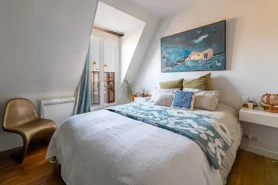 Un ou plusieurs lits dans un hébergement de l'établissement Cozy escape in a refined 2 room - Paris 14e
