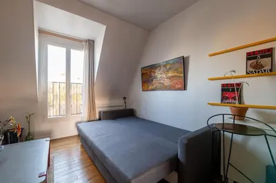Un ou plusieurs lits dans un hébergement de l'établissement Cozy escape in a refined 2 room - Paris 14e