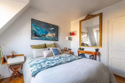 Un ou plusieurs lits dans un hébergement de l'établissement Cozy escape in a refined 2 room - Paris 14e