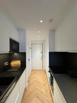 Cuisine ou kitchenette dans l'établissement 2 bedroom apartment renovated in the heart of Paris