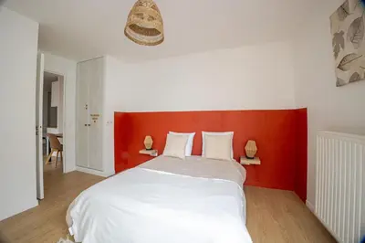 Un ou plusieurs lits dans un hébergement de l'établissement 2 room apartment near PARIS and Metro line 4