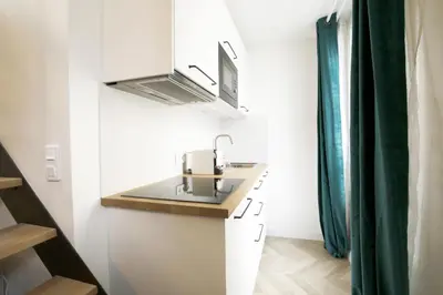 Cuisine ou kitchenette dans l'établissement Relish Best Paris Baguette in Light-Filled Duplex