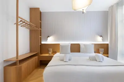 Un ou plusieurs lits dans un hébergement de l'établissement Luxury Apartment Saint Honore I