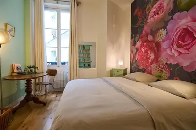 Un ou plusieurs lits dans un hébergement de l'établissement Geranimus Picasso Heart of Paris