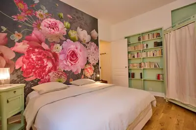Un ou plusieurs lits dans un hébergement de l'établissement Geranimus Picasso Heart of Paris
