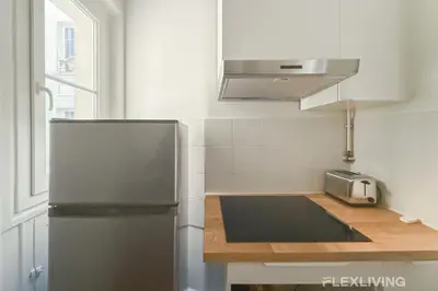 Cuisine ou kitchenette dans l'établissement Cozy Room in Alésia Paris 14th