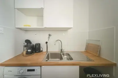 Cuisine ou kitchenette dans l'établissement Cozy Room in Alésia Paris 14th