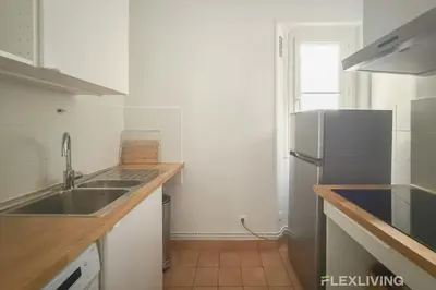 Cuisine ou kitchenette dans l'établissement Cozy Room in Alésia Paris 14th