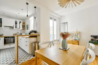 Cuisine ou kitchenette dans l'établissement Appartement cosy en plein 11eme arrondissement
