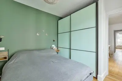 Un ou plusieurs lits dans un hébergement de l'établissement Appartement cosy en plein 11eme arrondissement