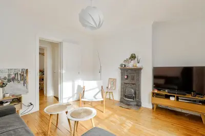 Télévision ou salle de divertissement dans l'établissement Appartement cosy en plein 11eme arrondissement