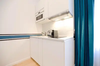 Cuisine ou kitchenette dans l'établissement CIA - Vosges Gem