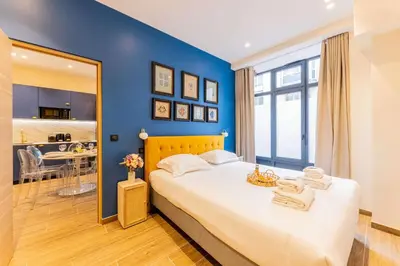 Un ou plusieurs lits dans un hébergement de l'établissement Amazing apartment - 2BR 6P - Gare du Nord