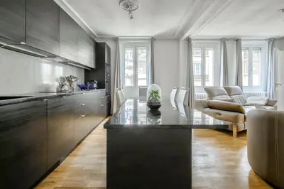 Coin salon dans l'établissement Appartement au coeur du 17eme