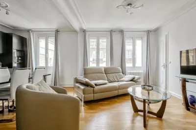 Télévision ou salle de divertissement dans l'établissement Appartement au coeur du 17eme