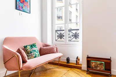 Coin salon dans l'établissement GuestReady - A lovely stay in Batignolles