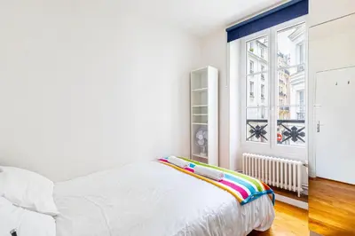 Un ou plusieurs lits dans un hébergement de l'établissement GuestReady - A lovely stay in Batignolles