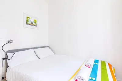 Un ou plusieurs lits dans un hébergement de l'établissement GuestReady - A lovely stay in Batignolles