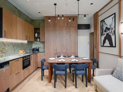 Cuisine ou kitchenette dans l'établissement Merveil - Signature Suite - Champs Elysees - Dulud I