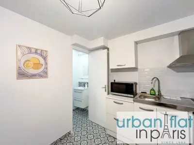 Cuisine ou kitchenette dans l'établissement 195 - Saint Denis Triplex