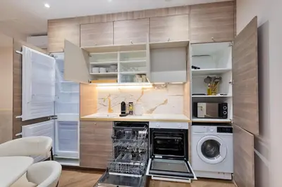 Cuisine ou kitchenette dans l'établissement Sophie Stay Montorgeuil -2BR 6P Wi-Fi