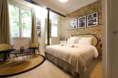 Un ou plusieurs lits dans un hébergement de l'établissement CIA - Faubourg Montmartre Studio