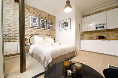 Un ou plusieurs lits dans un hébergement de l'établissement CIA - Faubourg Montmartre Studio