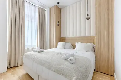 Un ou plusieurs lits dans un hébergement de l'établissement Montparnasse - Modern & renovated 3BD for 8 guests