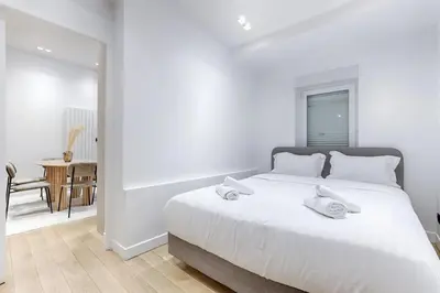 Un ou plusieurs lits dans un hébergement de l'établissement Montparnasse - Modern & renovated 3BD for 8 guests