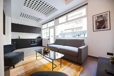 Télévision ou salle de divertissement dans l'établissement CIA - Grenelle Residence