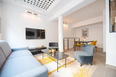 Télévision ou salle de divertissement dans l'établissement CIA - Grenelle Residence