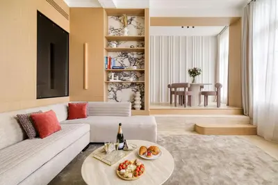 Coin salon dans l'établissement Oniri - Serviced Apartments Notre Dame - Quai des Grands Augustins