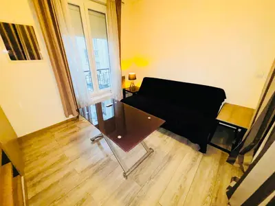 Coin salon dans l'établissement Appartement Tour Eiffel ALESIA PARIS