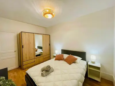 Un ou plusieurs lits dans un hébergement de l'établissement Appartement Maridor Porte de Versailles Paris