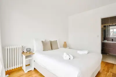 Un ou plusieurs lits dans un hébergement de l'établissement GuestReady - Charming stay with a view