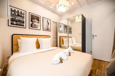 Un ou plusieurs lits dans un hébergement de l'établissement CIA - Bastille Coziness