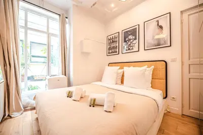 Un ou plusieurs lits dans un hébergement de l'établissement CIA - Bastille Coziness