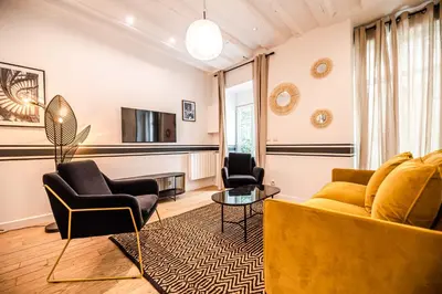 Télévision ou salle de divertissement dans l'établissement CIA - Bastille Coziness
