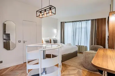 Un ou plusieurs lits dans un hébergement de l'établissement Typical Parisian Apartment in Le Marais#4 pers