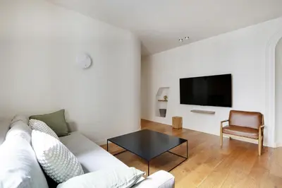 Télévision ou salle de divertissement dans l'établissement Pick A Flat's Apartments in Madeleine - Rue Tronchet